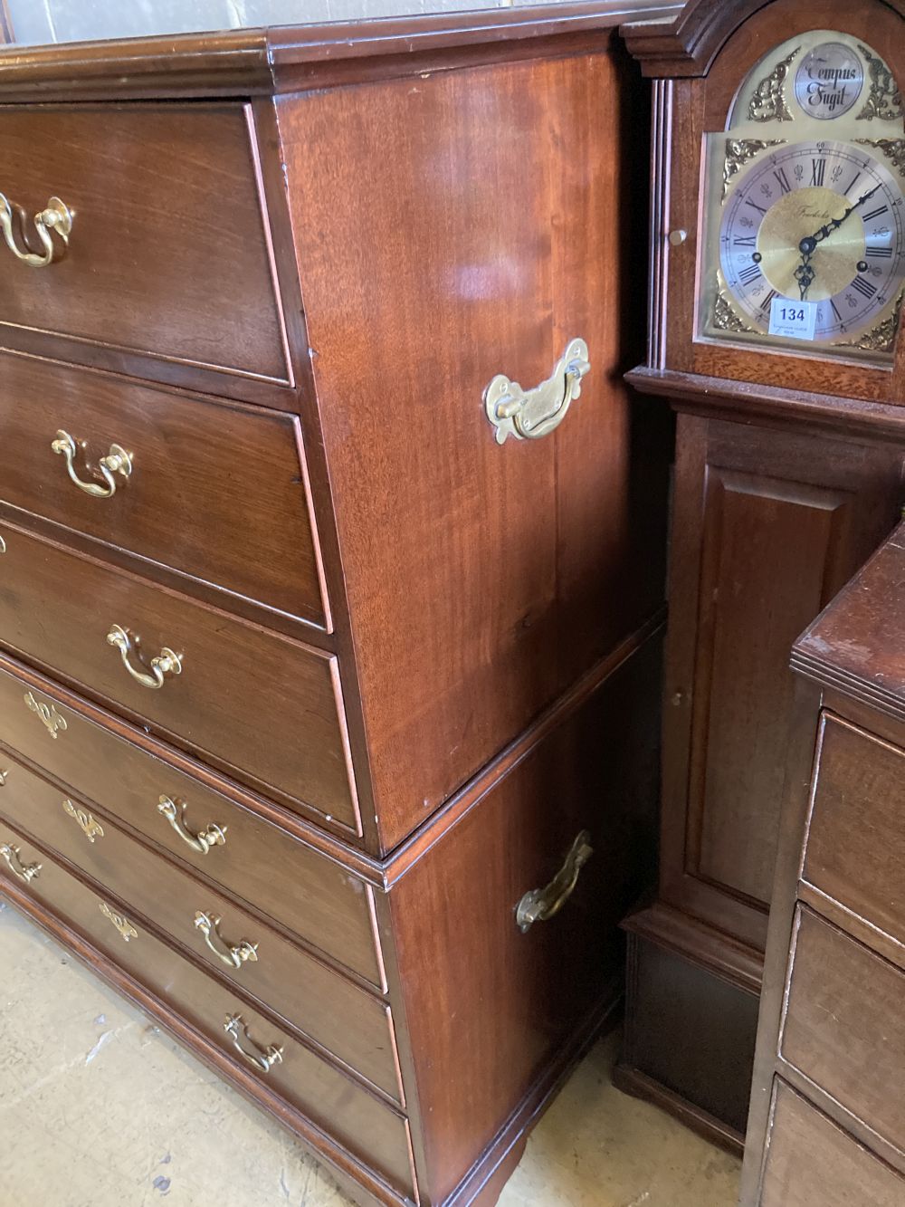 A George III mahogany chest of six drawers, in two sections, width 120cm, depth 54cm, height 145cm